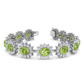 Retrograde Birthstones™ 22 Carat Oval Shape Peridot and Halo Diamond Bracelet In 14 Karat White Gold, 7 Inches