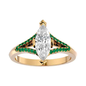 1 1/4 Carat Marquise Shape Diamond and Emerald Engagement Ring In 14 Karat Yellow Gold