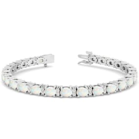 Opal Bracelet With 4 1/2 Carats of Oval Shape Opals and Diamonds In 14 Karat White Gold, 7 Inches
