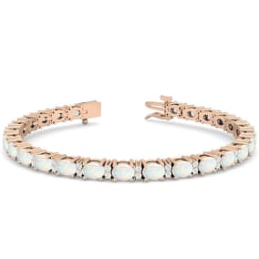 Opal Bracelet With 4 1/2 Carats of Oval Shape Opals and Diamonds In 14 Karat Rose Gold, 7 Inches