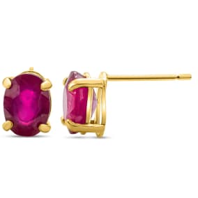 2 Carat Oval Shape Ruby Stud Earrings In 14K Yellow Gold