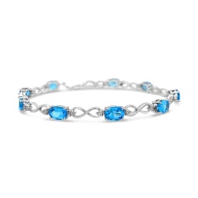 9 Carat Blue Topaz and Diamond Bracelet In Sterling Silver, 7-9 Inches