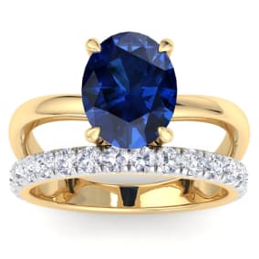 3.60 Carat Oval Shape Sapphire and Halo Diamond Ring Plus Band In 14 Karat Yellow Gold