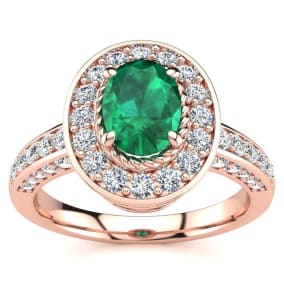 1 1/2 Carat Oval Shape Emerald and Halo Diamond Ring In 14 Karat Rose Gold