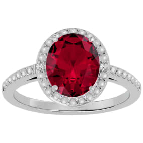 3 ½ Carat Ruby and Diamond Halo Ring created in platinum overlay
