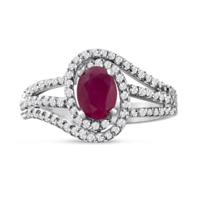 Estate Jewelry 1 Carat Oval Shape Ruby and Swirling Halo Diamond Ring In 14 Karat White Gold, Size 7