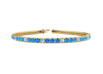 Blue Topaz and Diamond Alternating Tennis Bracelet