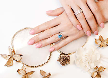 Blue Topaz and Halo Diamond Ring